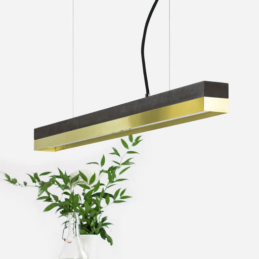 dark grey concrete and brass rectangular pendant light