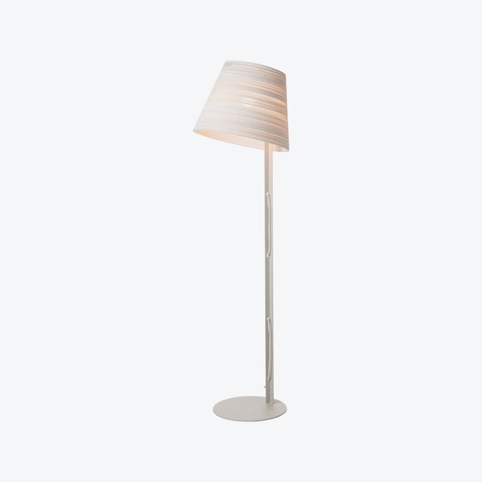 designer floor lamp with tilted shade made from sustainable recycled cardboard in white
