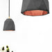 Concrete Triangle Pendant Light with Copper interior by GANTlights